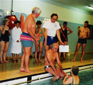 People getting into a swimming pool safely